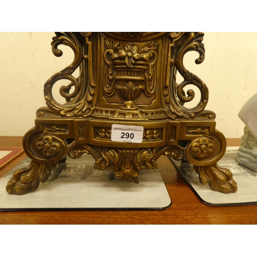 290 - A modern Victorian design, gilt metal cased mantel clock of ornate architectural design, faced by a ... 