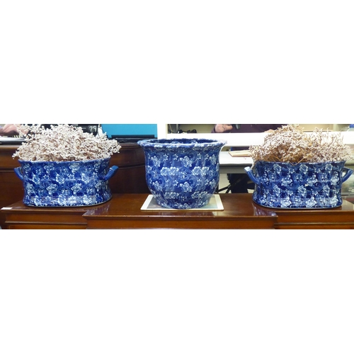 299 - Two Victorian style china footbath design planters in blue and white  18