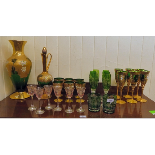 306 - Glassware: to include Venetian and Bohemian green, clear overpainted and other pedestal wines and tu... 