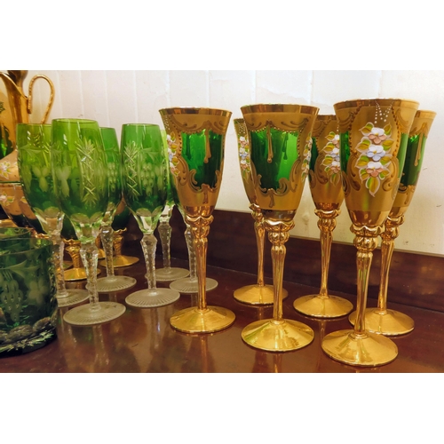 306 - Glassware: to include Venetian and Bohemian green, clear overpainted and other pedestal wines and tu... 