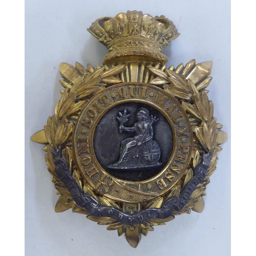 309 - A Norfolk Regt. helmet plate (Please Note: this lot is subject to the statement made in the Auc... 