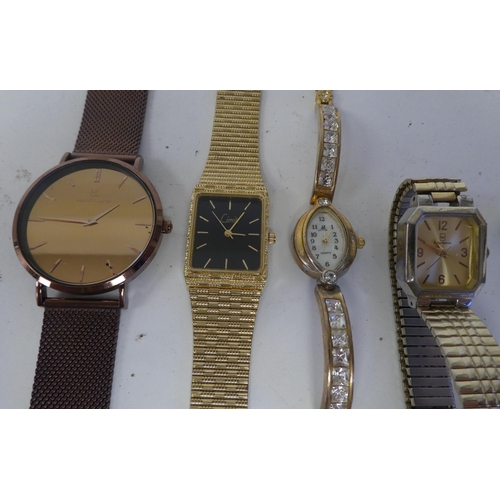 39 - Variously cased and strapped wristwatches