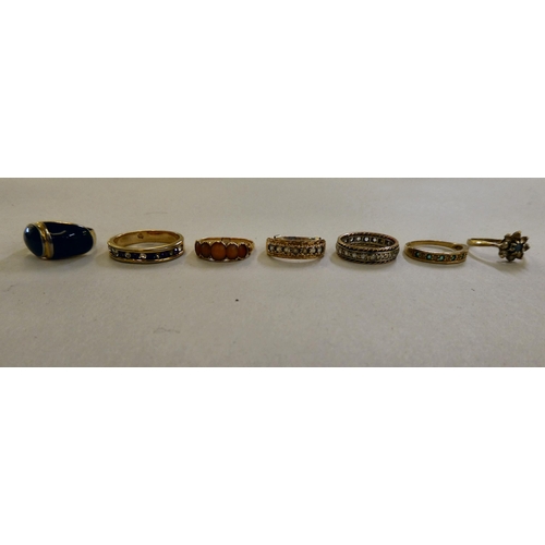 68 - Seven various gold coloured metal and other, variously set dress rings