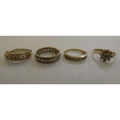 68 - Seven various gold coloured metal and other, variously set dress rings