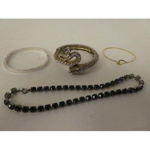 74 - Costume jewellery: to include brooches; bangles; rings; and earrings