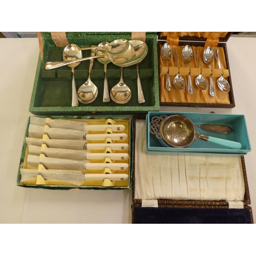 82 - A mixed lot of silver plated and other cutlery: to include table knives