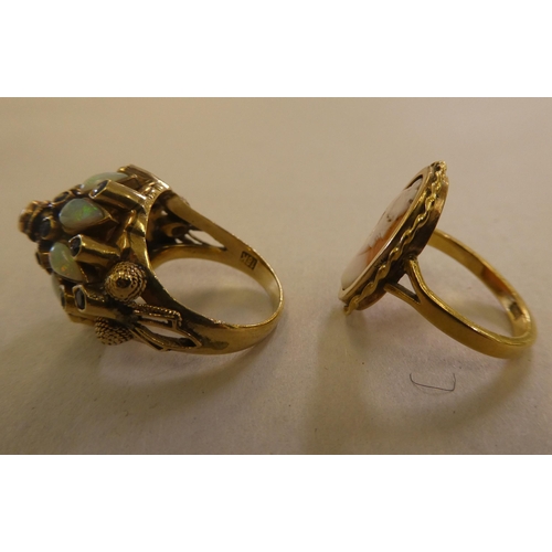 87 - An 18ct gold dress ring, set with opals and other stones; and an 18ct gold, oval cameo portrait ring