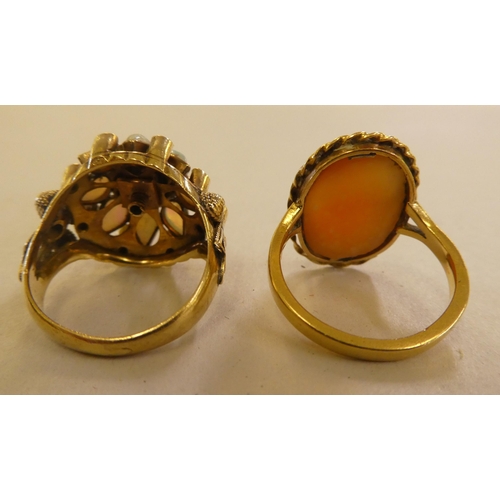 87 - An 18ct gold dress ring, set with opals and other stones; and an 18ct gold, oval cameo portrait ring