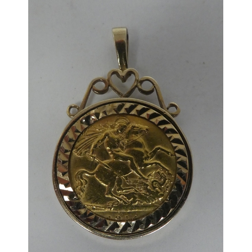 94 - A George V half sovereign, St George on the obverse  1914, in a 9ct gold, scrolled pendant moun... 