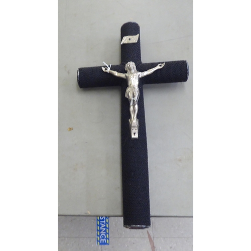 72 - A black micro-bead covered crucifix with a white metal Corpus Christi  31