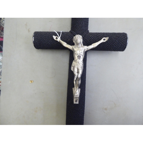 72 - A black micro-bead covered crucifix with a white metal Corpus Christi  31