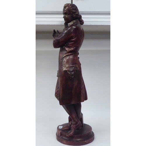 104 - A bronze effect plaster figure 'Mozart'  30