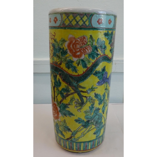 108 - A modern Chinese porcelain cylindrical stickstand, decorated with dragons and flora  18