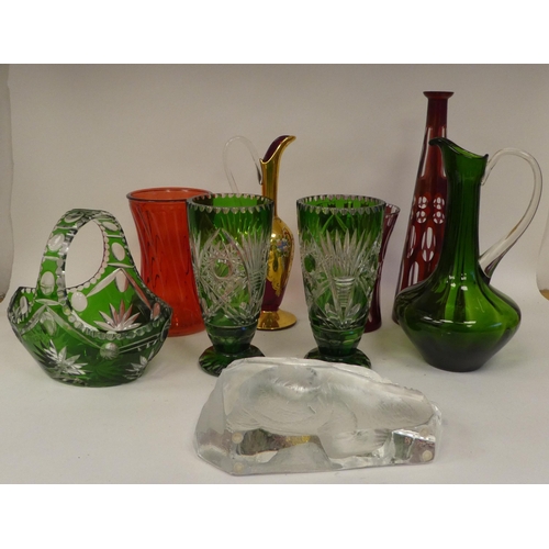 109 - Glassware, mainly clear and green tinted vases and tableware  largest  14