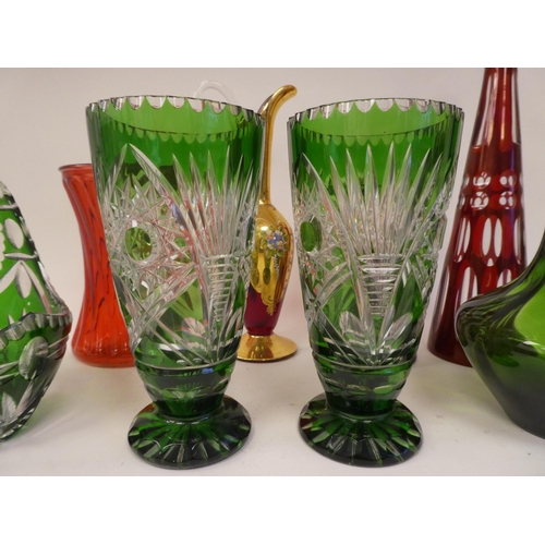 109 - Glassware, mainly clear and green tinted vases and tableware  largest  14