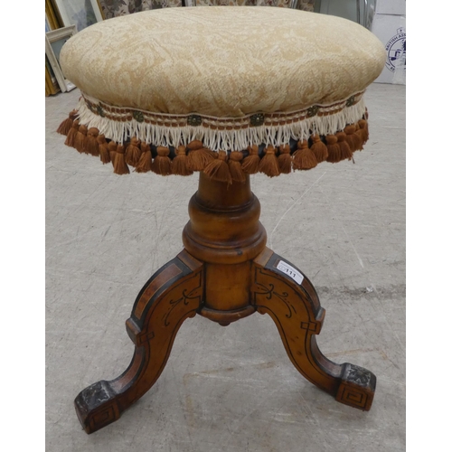 111 - An Edwardian stool, the later fabric upholstered circular seat raised on a fruitwood tripod base&nbs... 