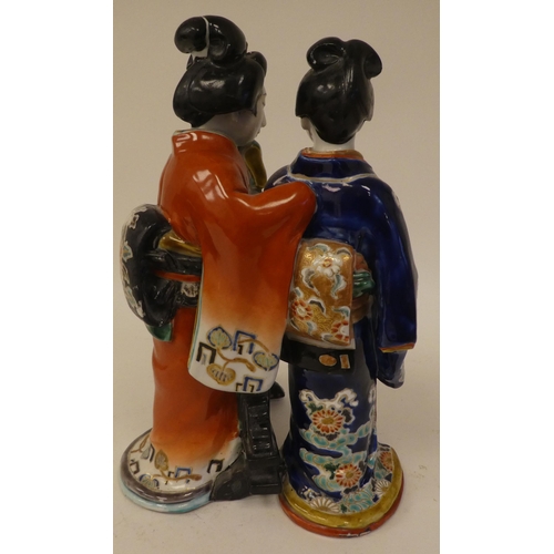 113 - Modern Oriental ceramics: to include figures wearing traditional robes  largest 19