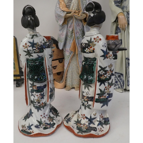 113 - Modern Oriental ceramics: to include figures wearing traditional robes  largest 19