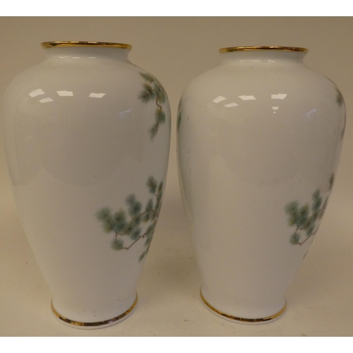 118 - Decorative ceramics: to include a pair of Sheffield pottery twin handled china vases, decorated with... 