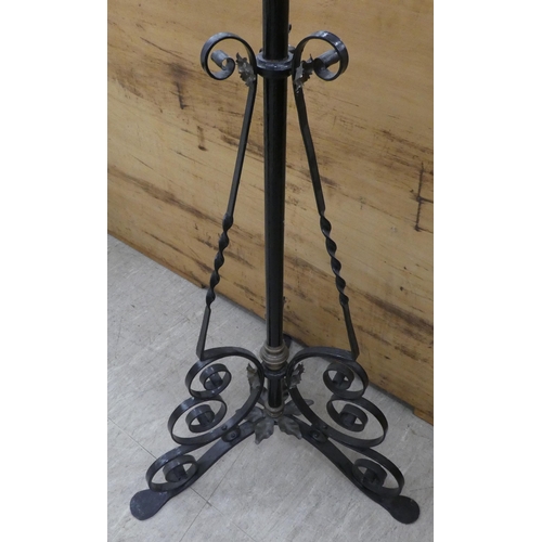 120 - A 20thC black painted cast and wrought metal standard lamp frame  51