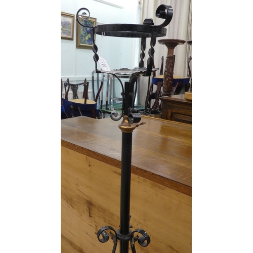 120 - A 20thC black painted cast and wrought metal standard lamp frame  51