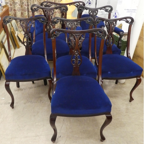 121 - An Edwardian mahogany showwood framed salon suite  comprising a two person settee and six chair... 