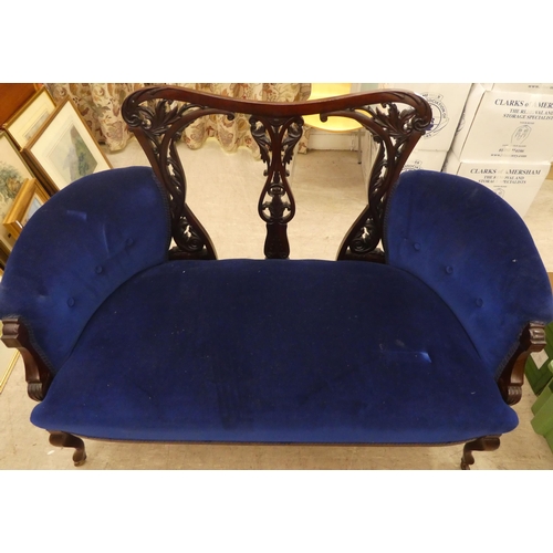 121 - An Edwardian mahogany showwood framed salon suite  comprising a two person settee and six chair... 