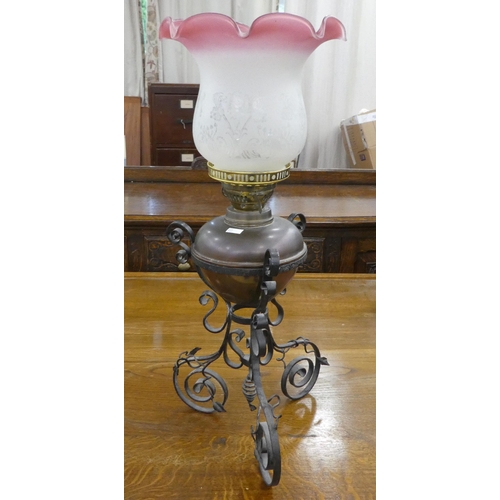 122 - Interior designer accessories: to include a Victorian style wrought metal framed oil lamp  16