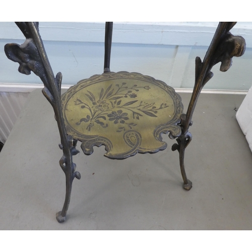 126 - A modern cast iron and brass, two-tier cakestand  27