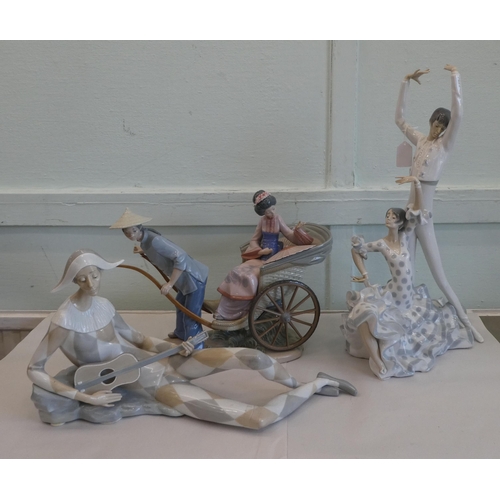 128 - Three Lladro porcelain figures, viz. two dancer  19