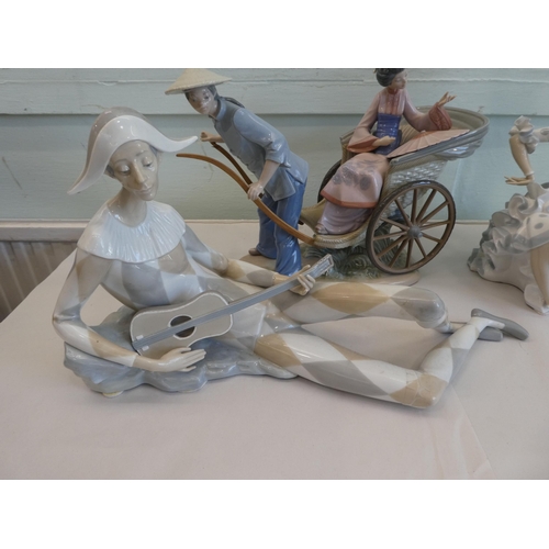 128 - Three Lladro porcelain figures, viz. two dancer  19