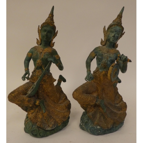 129 - 20thC Thai, European and other collectables: to include a pair of cast metal dancers  11