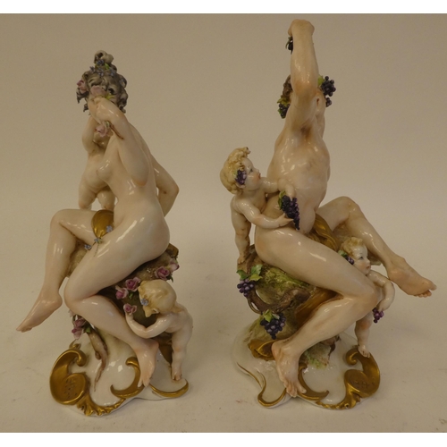 142 - A pair of 20thC Naples porcelain, classically inspired figures with cherubic children  8.5