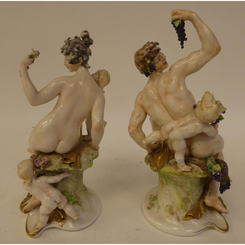 142 - A pair of 20thC Naples porcelain, classically inspired figures with cherubic children  8.5