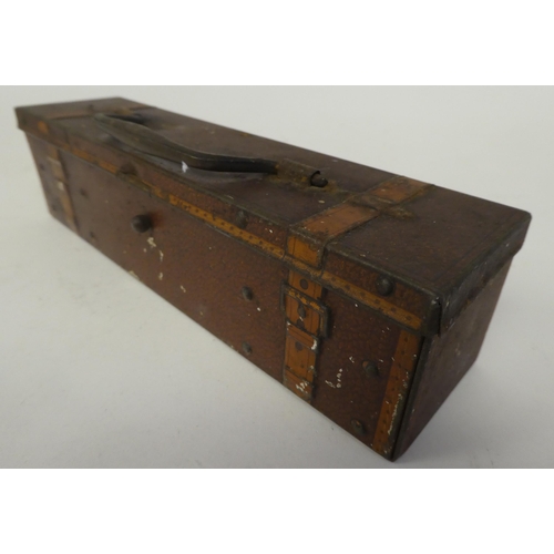 146 - A Vintage Huntley & Palmers printed tinplate biscuit box, fashioned as a trunk with a bail handl... 