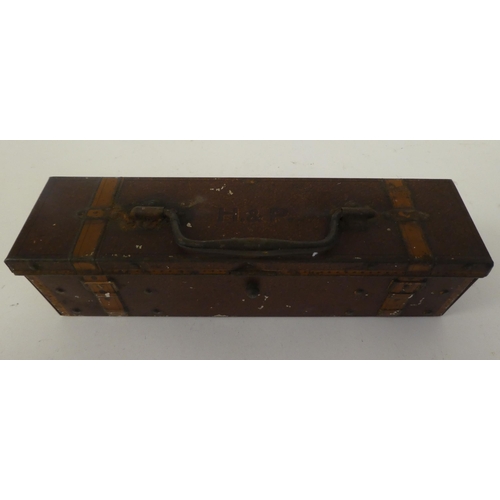 146 - A Vintage Huntley & Palmers printed tinplate biscuit box, fashioned as a trunk with a bail handl... 