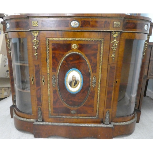 178 - A mid Victorian string inlaid burr walnut and quarter veneered credenza, the bow and breakfront frie... 