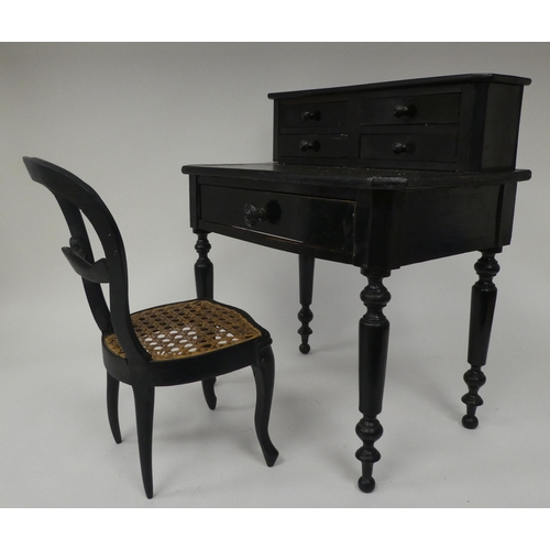 179 - A late 19thC ebonised pine apprentice piece, bonheur du jour with a drawer fitted superstructure, ra... 