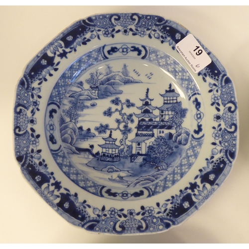 19 - A set of six 18thC Chinese porcelain dishes of octagonal outline, decorated in blue and white with p... 
