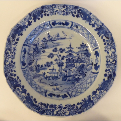 19 - A set of six 18thC Chinese porcelain dishes of octagonal outline, decorated in blue and white with p... 