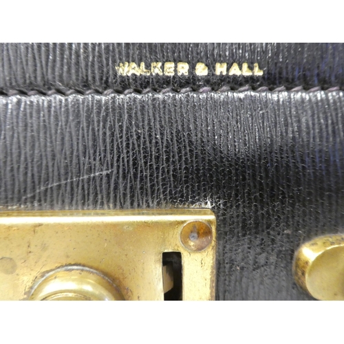 59 - A Walker & Hall stitched dark blue hide vanity case with gold plated locks, the hinged lid enclo... 