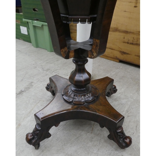 75 - A late Victorian rosewood veneered sewing table, the octagonal deep section raised on splayed suppor... 