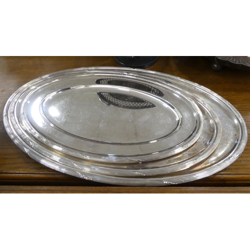 93 - Silver plated tableware: to include oval serving trays  largest 18