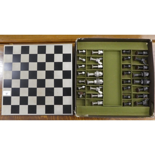 97 - A novelty chess set, the metal board  14