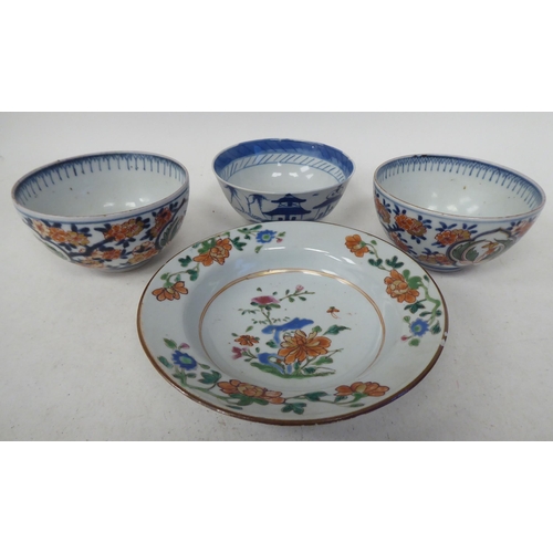 109 - 19thC Chinese porcelain: to include a pair of footed bowls, decorated in colours with floral designs... 