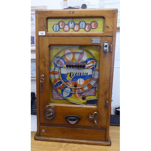 148 - A vintage penny-in-the-slot, mechanical 'Playball' bagatelle machine, in a wall mountable light oak ... 