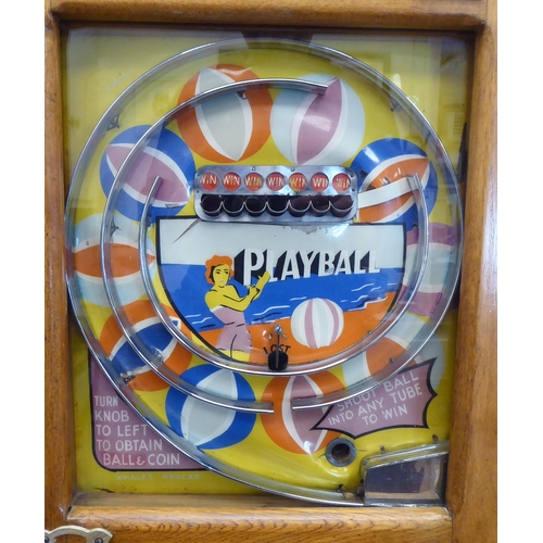 148 - A vintage penny-in-the-slot, mechanical 'Playball' bagatelle machine, in a wall mountable light oak ... 