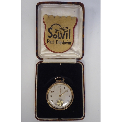 149 - A 1930s 9ct gold slim cased pocket watch, the keyless movement faced by a gilded Arabic Champagne di... 