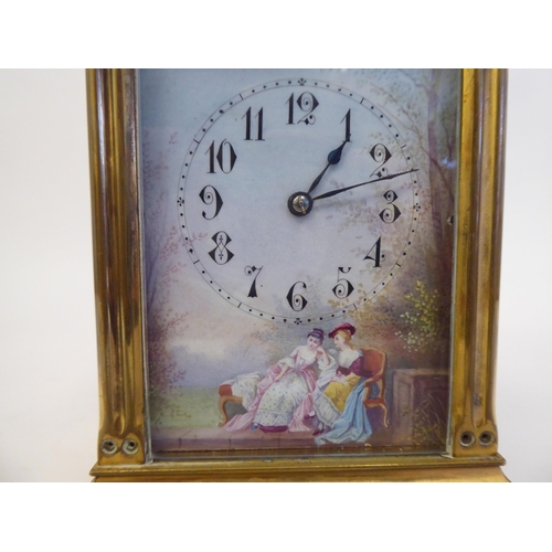 158 - An early 20thC lacquered brass cased carriage clock with reeded corner pillars and scrolled friezes,... 