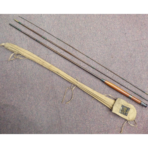 169 - A Hardy Bros Reelholder, three section fly fishing rod, in a dedicated canvas bag